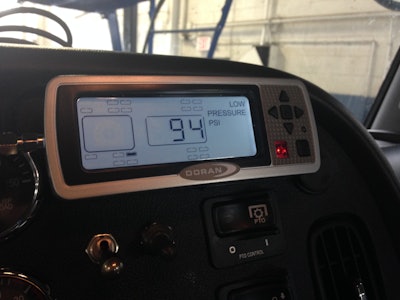 A tire pressure monitoring system display reading low tire pressure .