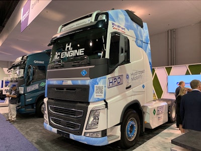 Westport's High Pressure Direct Injection trucks, a bio-LNG model on the left and a hydrogen version on the right, offer faster fill times than all-electric and greater range while drastically cutting emissions over conventional diesel.