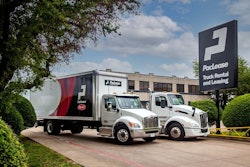 Two trucks in front of a building and a sign that reads PacLease TruckRental and Leasing.