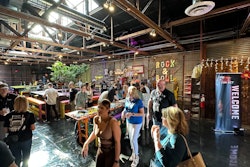 A light, bright restaurant full of people. A banner has the Diesel Connect logo and says welcome.