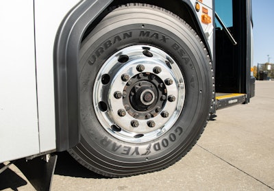 A new Goodyear Urban Max tire on a bus.