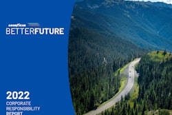 The cover of Goodyear's 2022 Corporate Responsibility Report is blue and features a highway winding through a forest with mountains in the background.