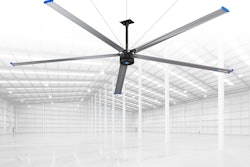 A giant fan in an open commercial or industrial space.