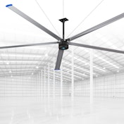 A giant fan in an open commercial or industrial space.