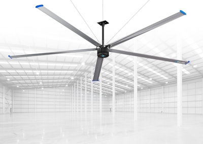 A giant fan in an open commercial or industrial space.