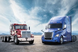 Freightliner trucks isolated against the sky