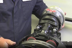 Bendix technician checking brake caliper