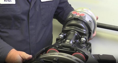 Bendix technician checking brake caliper