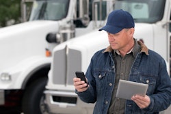 Driver with phone and tablet