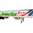 A trail king grain hopper trailer with an American flag and fields painted on it.