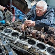 diesel mechanic working on engine