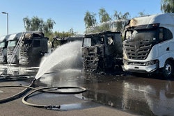 nikola semi truck being put out after fire