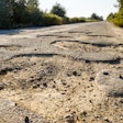 Bumpy road with potholes