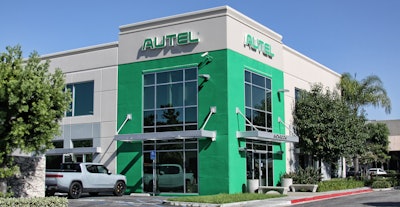 Autel's new innovation center, a beige and mint green two-story building with the green Autel logo.