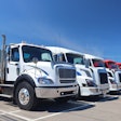 Line of trucks on a summer day
