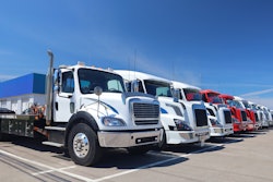 Line of trucks on a summer day