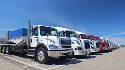 Line of trucks on a summer day