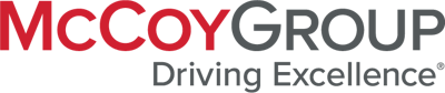 The gray and red McCoy Group logo that reads Driving Excellence.