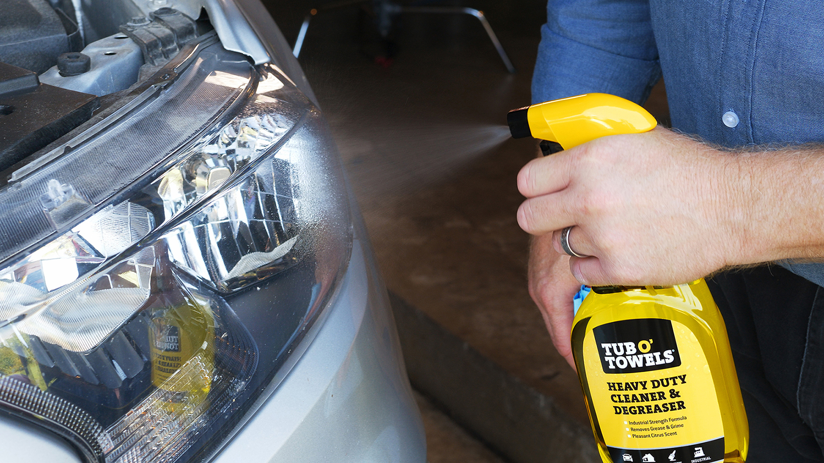 Tub O' Towels spray bottle in use