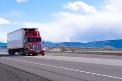 Truck on highway with Michelin retread tires