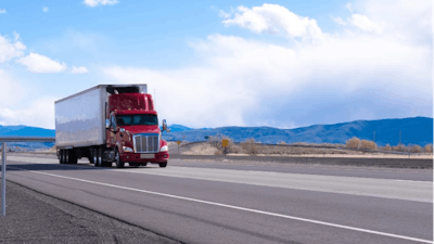 Truck on highway with Michelin retread tires