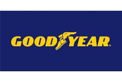 The gold Goodyear logo on a navy blue background