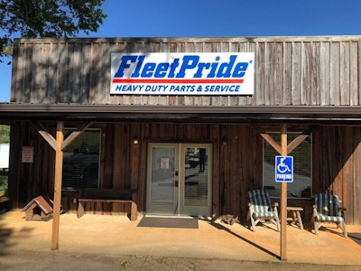 A new FleetPride sign on a storefront.