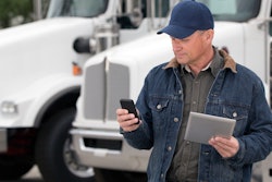Driver with phone and tablet