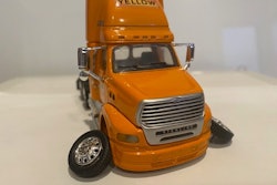 Yellow truck without wheels