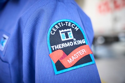 Thermo King Blue Track logo on shirt