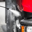 Truck being washed with pressure washer