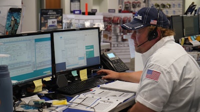 Blaine Brothers worker at computer
