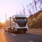 A Nikola truck going down the road