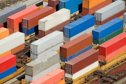 Containers double stacked in rail yard