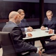 Group of businessmen in an office meeting