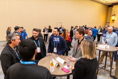 A room full of people at the Leaders of Tomorrow reception at HDAW.