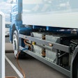Electric truck charging at station