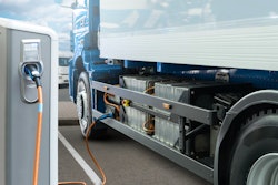Electric truck charging at station