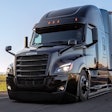Freightliner Cascadia on roadway on sunny day