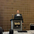 Craig Smith, vice president of marketing and communications, speaks at a press conference at TMC.