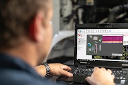 Technician checking coolant system with JPRO