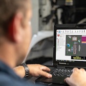 Technician checking coolant system with JPRO