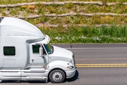 White truck going up hill