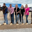Old River groundbreaking with seven people holding shovels