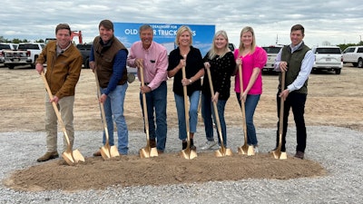 Old River groundbreaking with seven people holding shovels