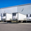 Reefer trailers parked at loading docks