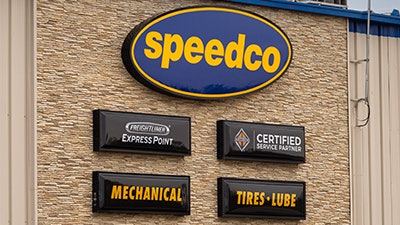 Speedco sign on the side of a Love's location