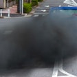 Pickup truck blowing smoke from exhaust pipe