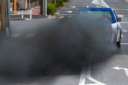 Pickup truck blowing smoke from exhaust pipe