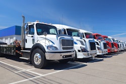Line of trucks on a summer day